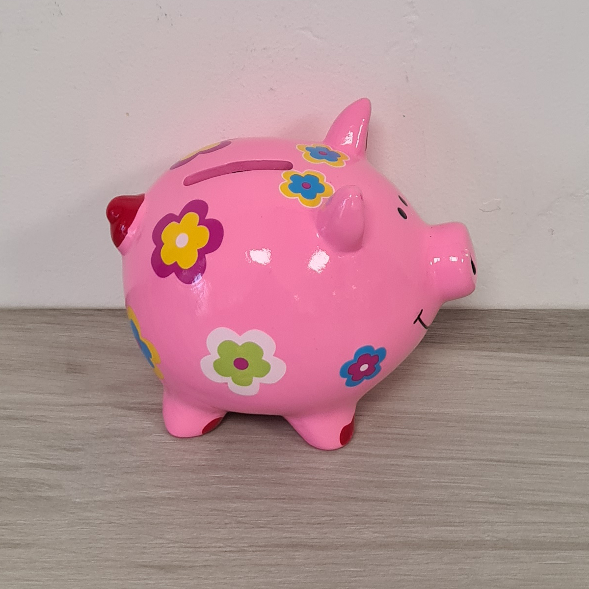 Petite tirelire cochon rose en cramique 10 cm
