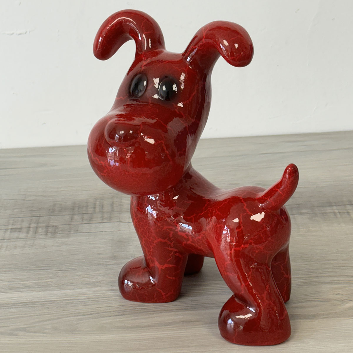 Statue en cramique chien rouge 25 cm