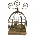 Chat décoratif en cage