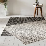 Tapis Ethnique 120 x 170 cm Modèle Noir uniquement Tapis Ethnique 120 x 170 cm Modèle Noir uniquement
