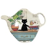 Soucoupe pour sachet de thé chaton sur le bureau
