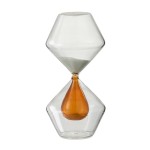 Sablier de décoration en verre ocre et sable blanc